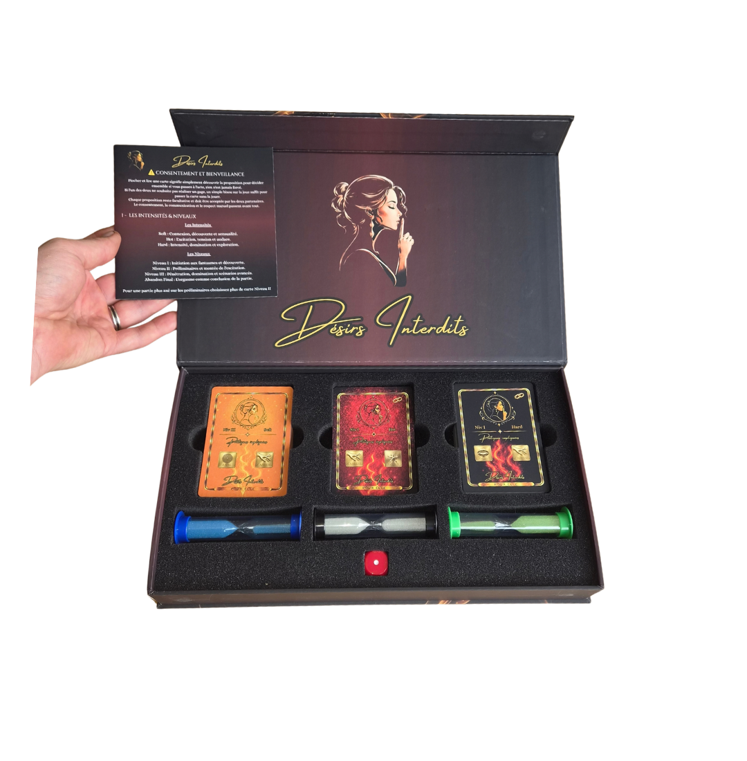Intérieur du coffret du jeu de couple Désirs Interdits montrant les cartes, les sabliers et la règle du jeu pour pimenter sa vie de couple
